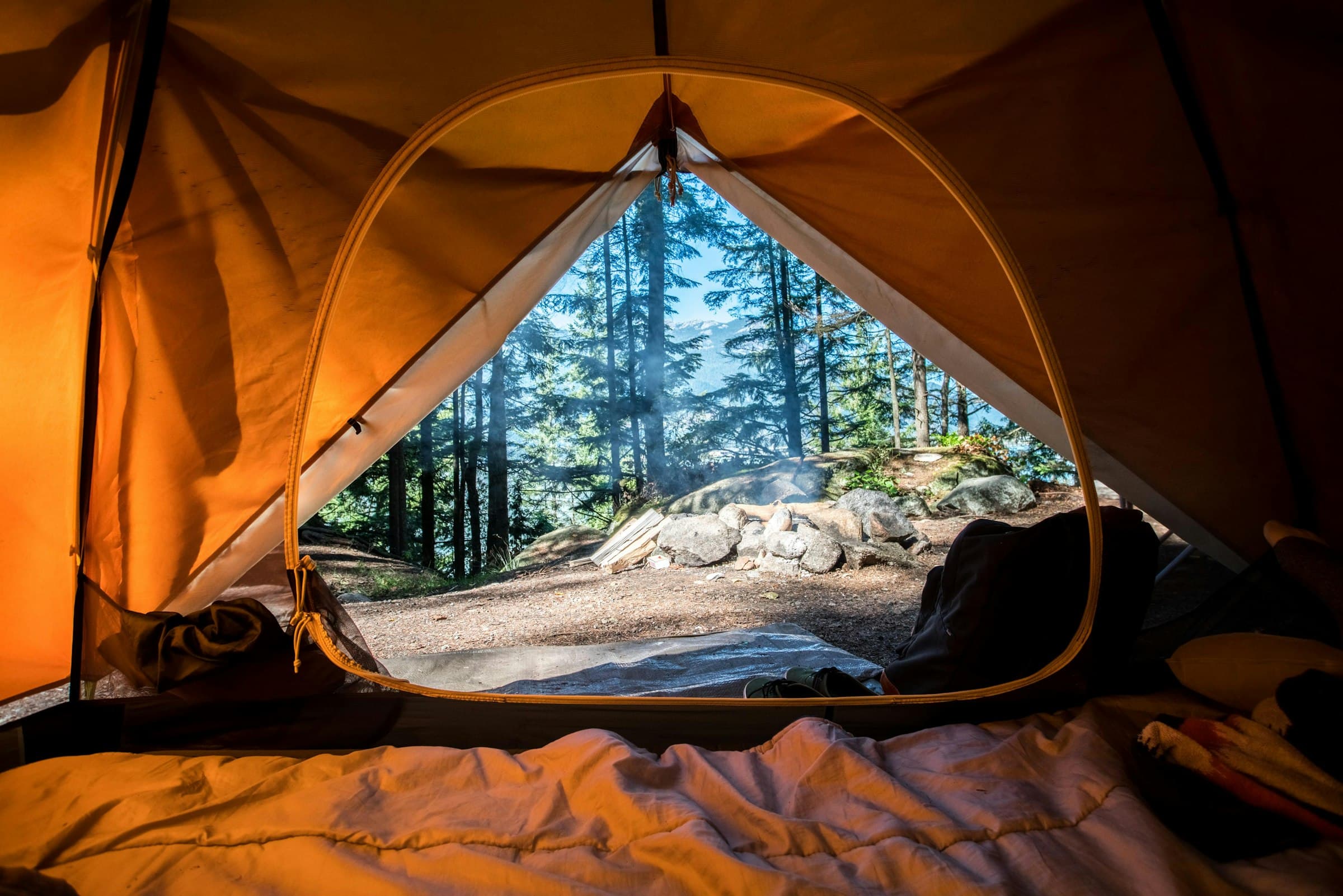 Tent under a starry sky at a remote campsite